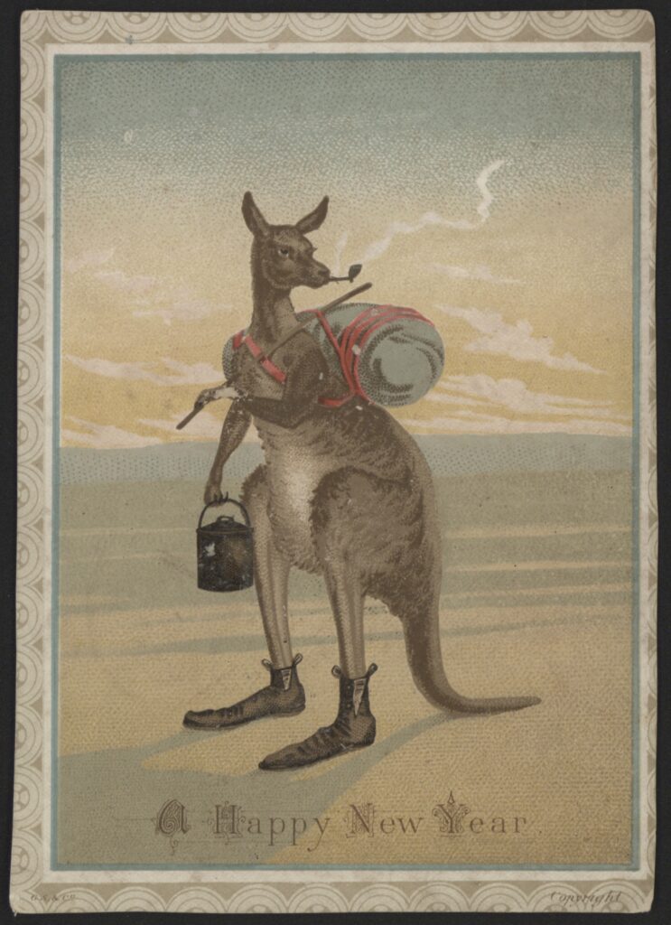 A greeting card with a kangaroo dressed as a swagman, wearing a swag and boots, holding a billycan and walking stick and smoking a pipe. An early morning sky with clouds and a wide open plain extend behind the kangaroo. Below the kangaroo are the words, ‘A Happy New Year’.